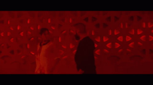 Animated GIF of Oscar Isaac and Alicia Vikander dancing in a scene from the film Ex Machina.
