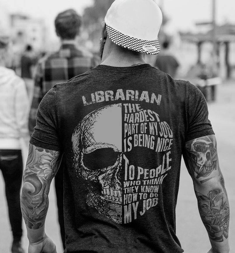 image of a muscular man in a t-shirt that says "Librarian—the hardest part of my job is being nice to people who think they know how to do my job."