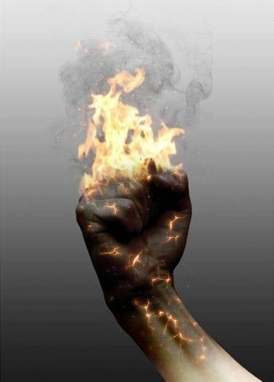 Image of a raised fist enveloped in fire