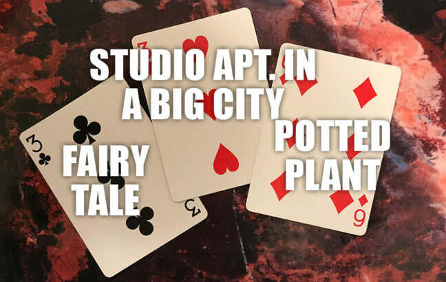 Photo of three playing cards for the writing prompt "Fairy tale, set in a studio apartment in a big city, containing a potted plant"